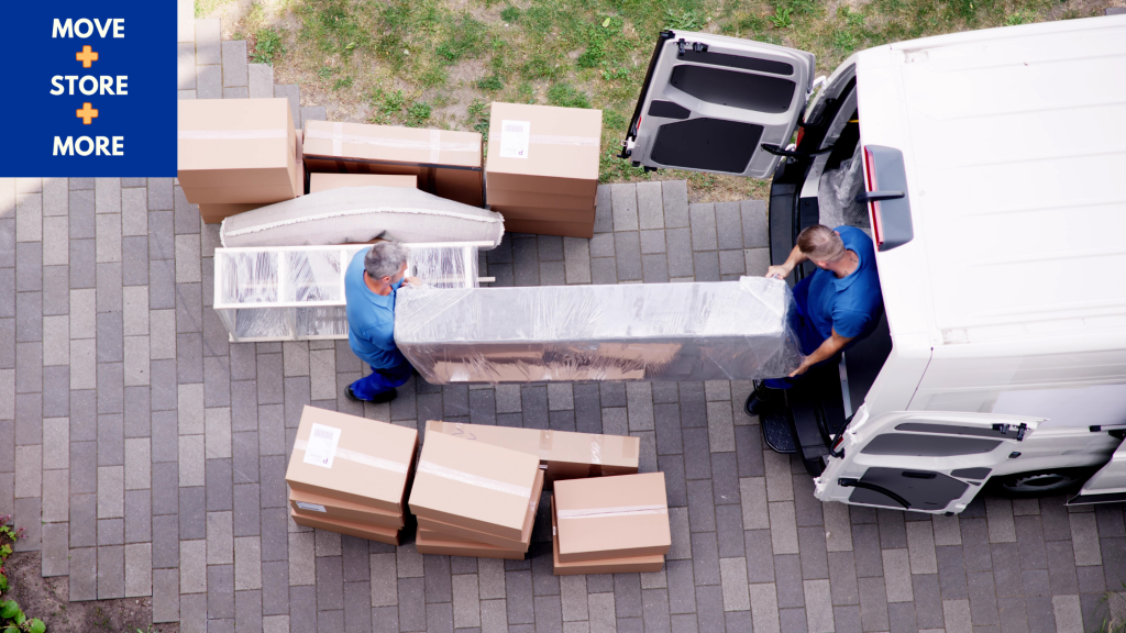 Image of movers packing a removal van.