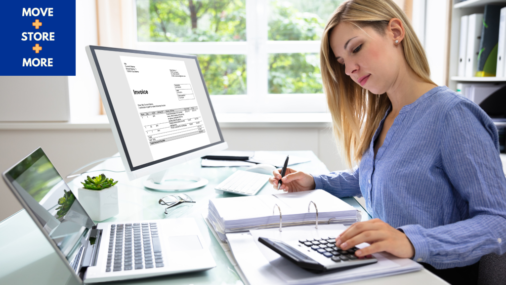 Image of a woman creating a moving budget on a laptop with a calculator - Move Store & More How to Save Money Before Moving House Blog Image